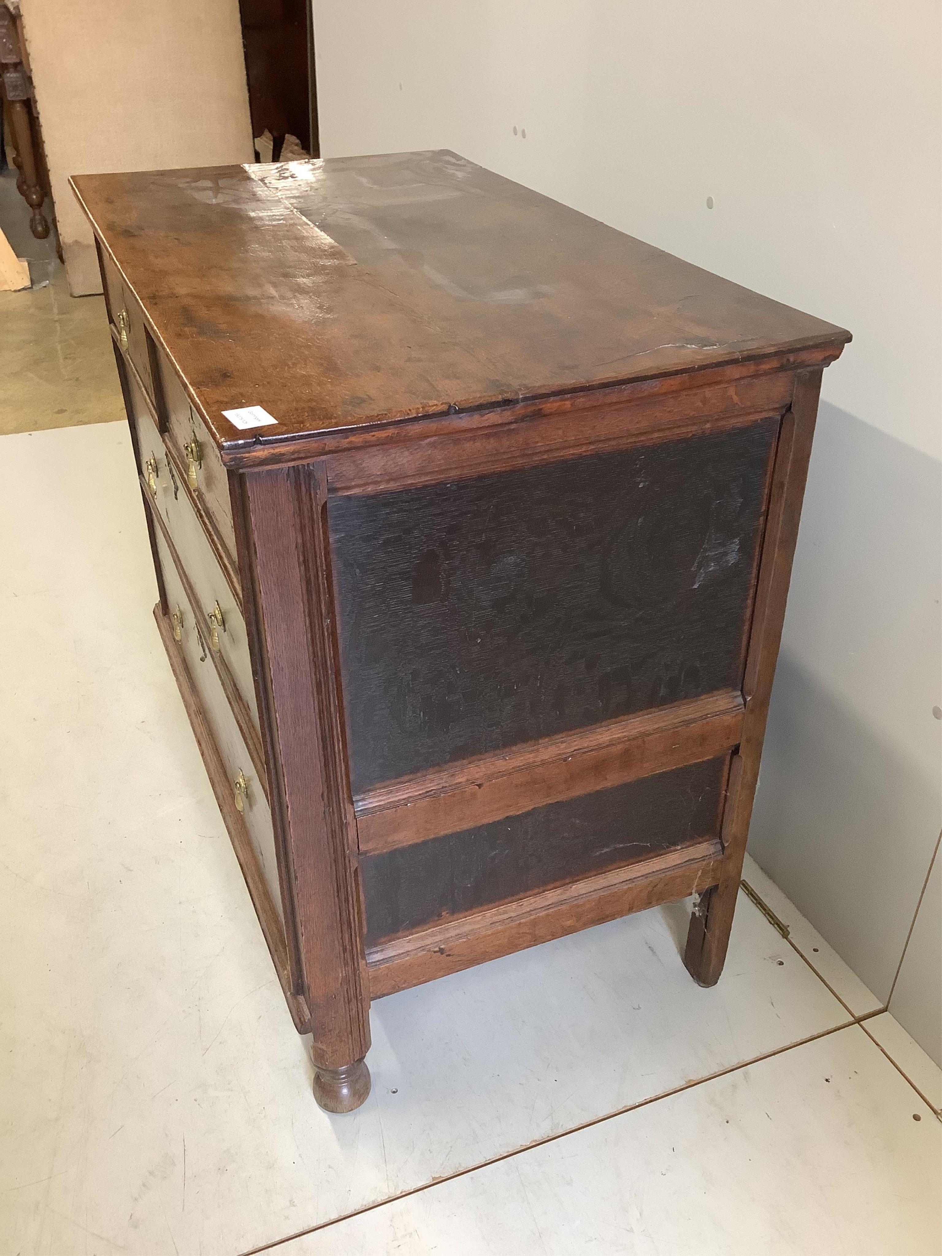 A late 18th century oak chest, fitted with two short and three long drawers, width 102cm, depth 58cm, height 88cm. Condition - fair